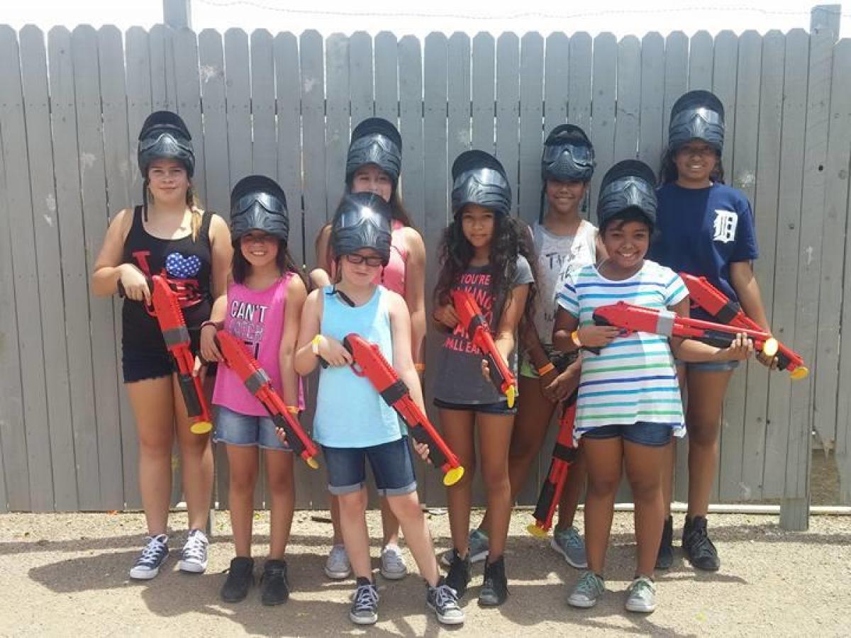 group of kids with splatmaster paintball guns