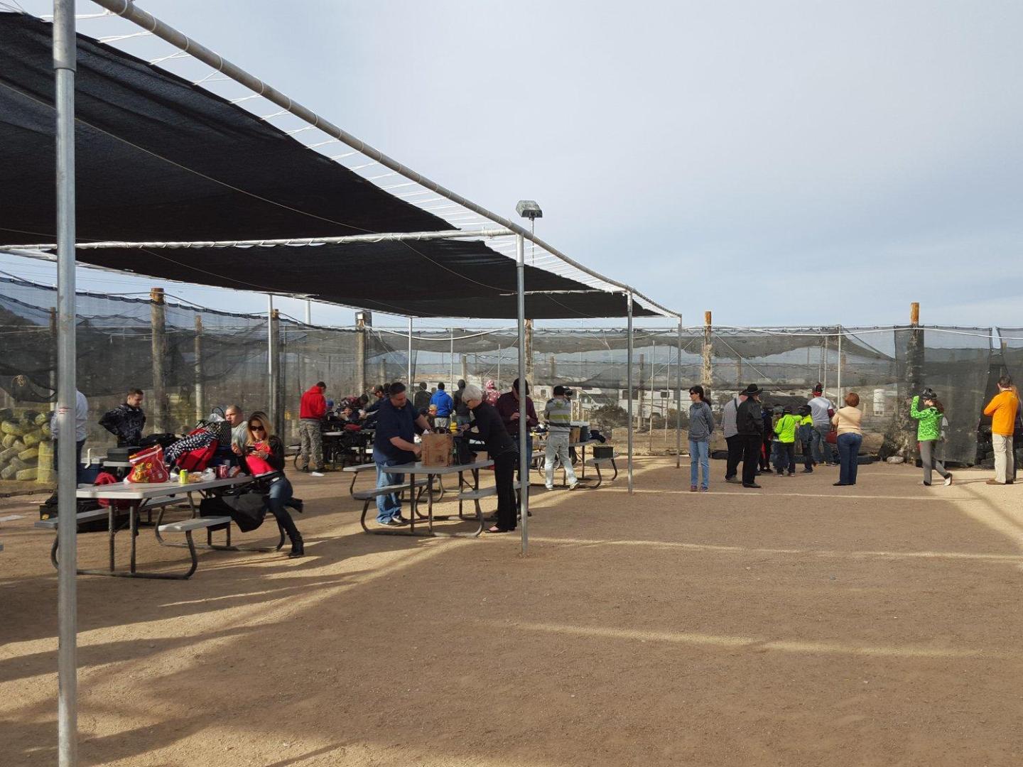 party setting up at picnic tables