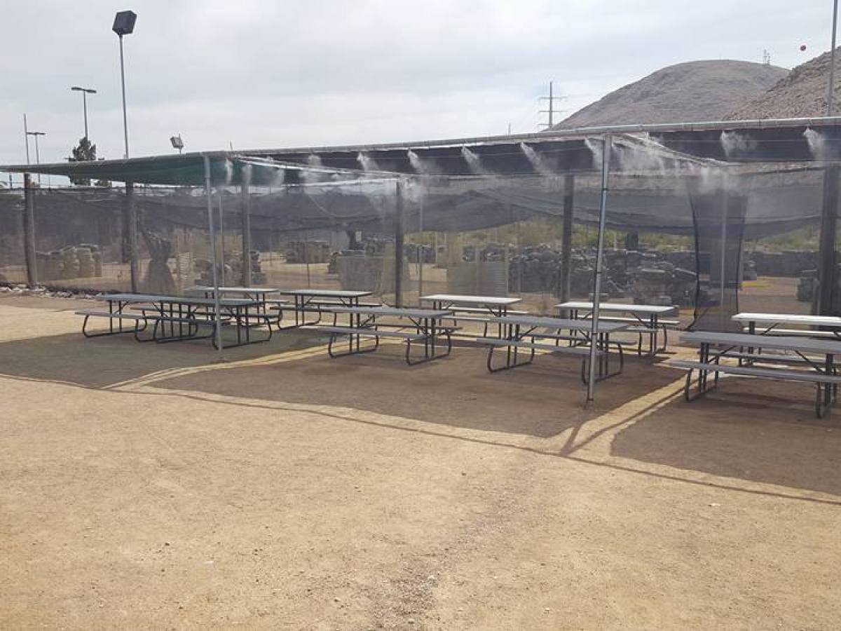 a train is parked on the side of a building