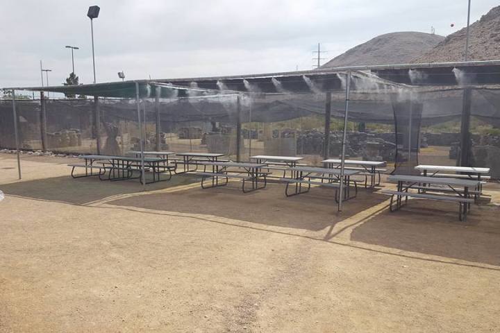 a train is parked on the side of a building