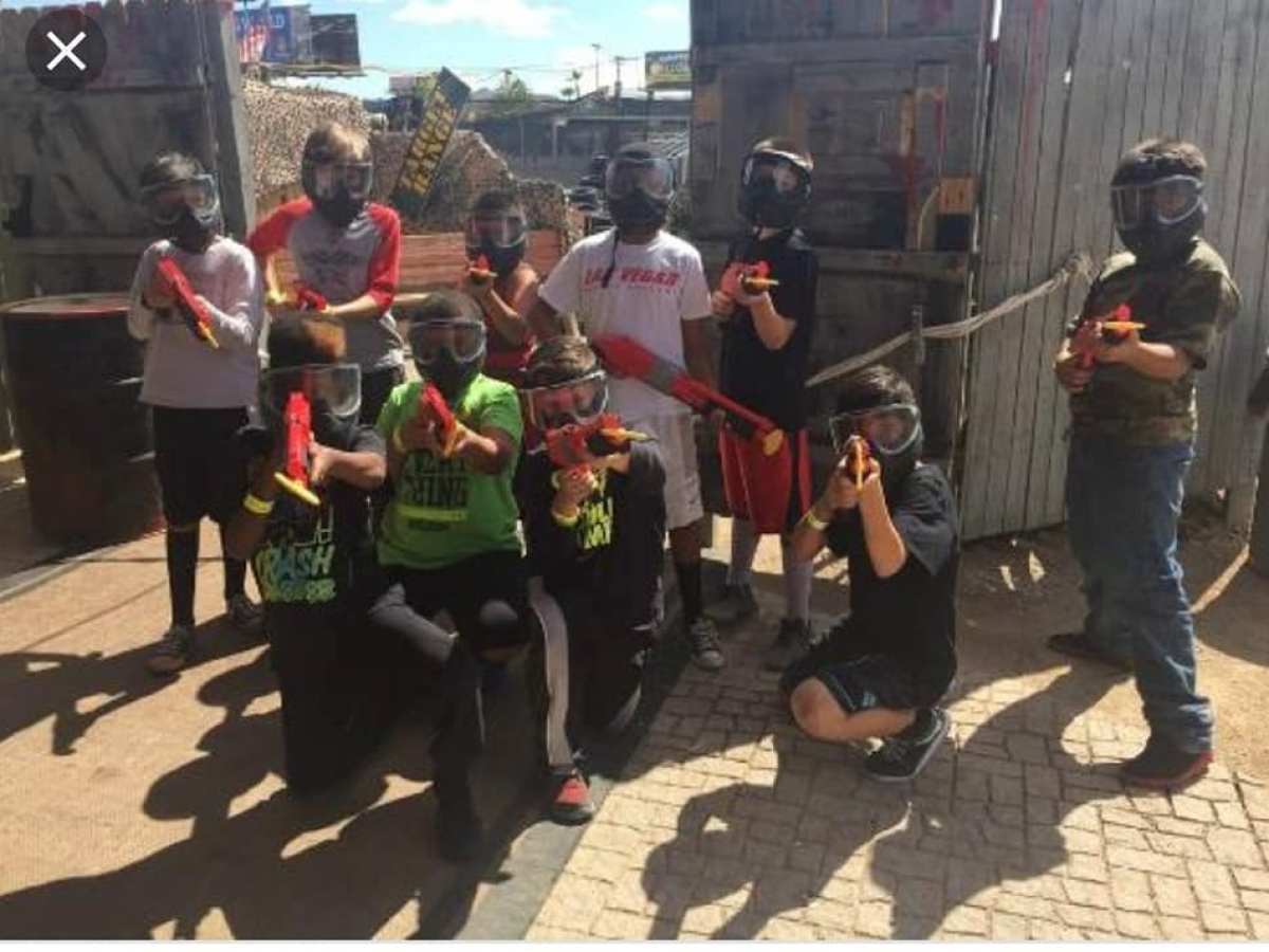 a group of people standing in front of a crowd