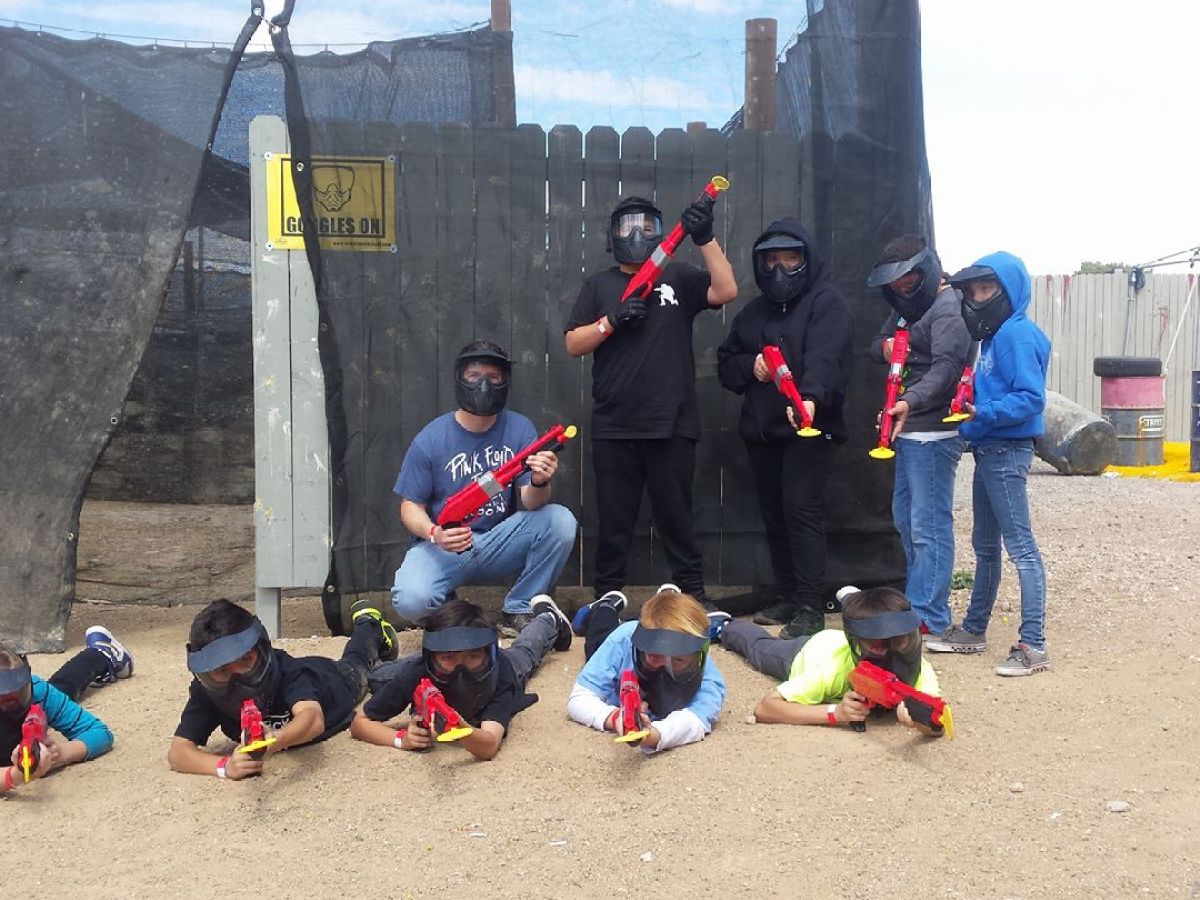 a group of people sitting on the ground