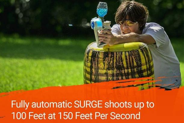 a person that is standing in the grass