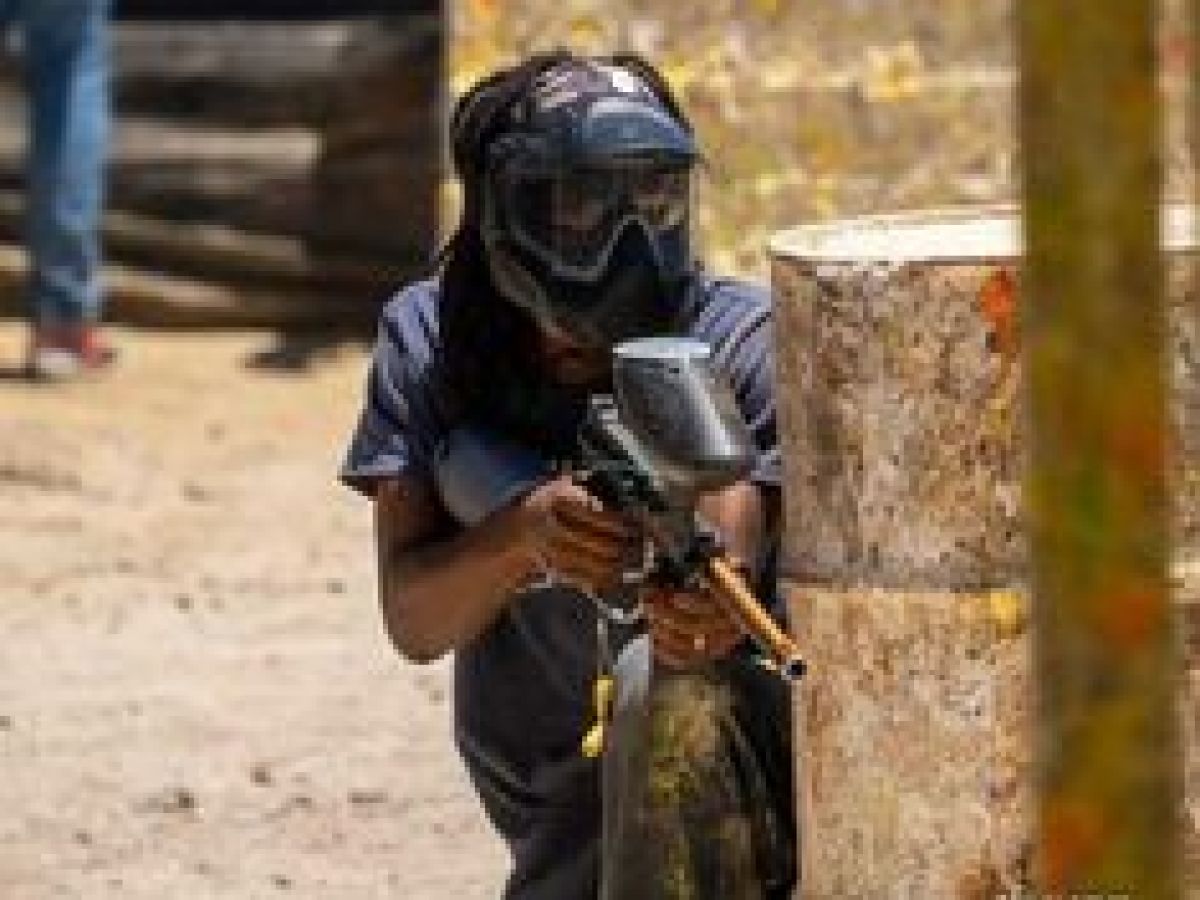 a man that is standing in the dirt