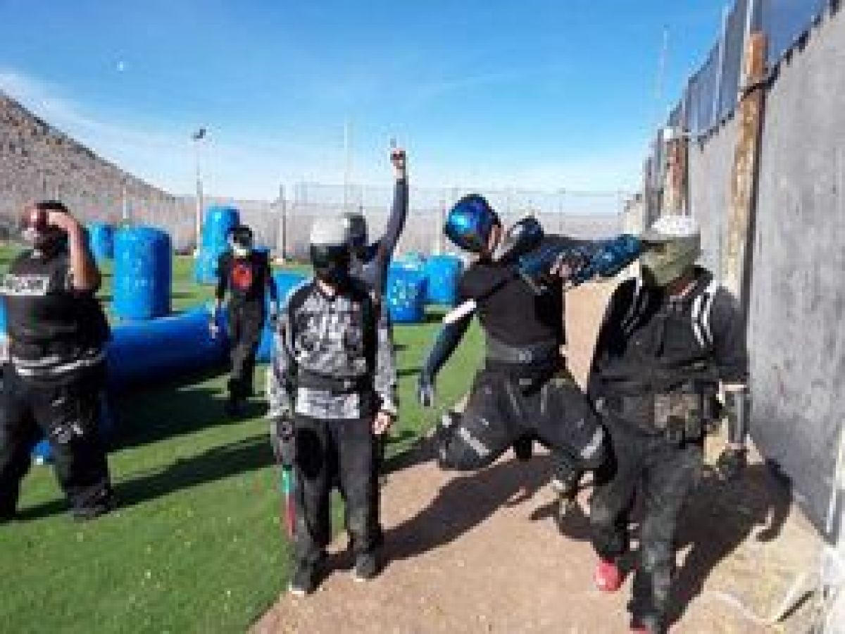 a group of people standing in front of a building