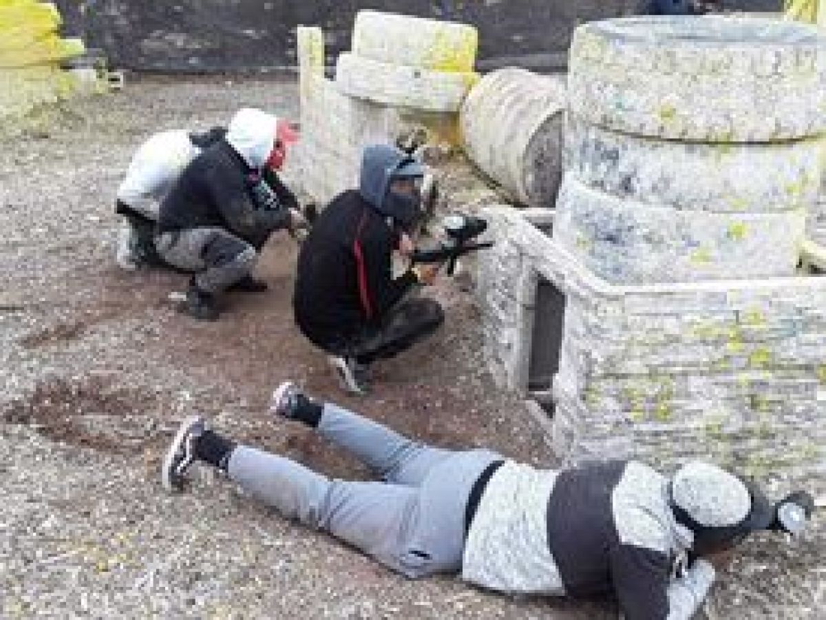 a group of people sitting on the ground