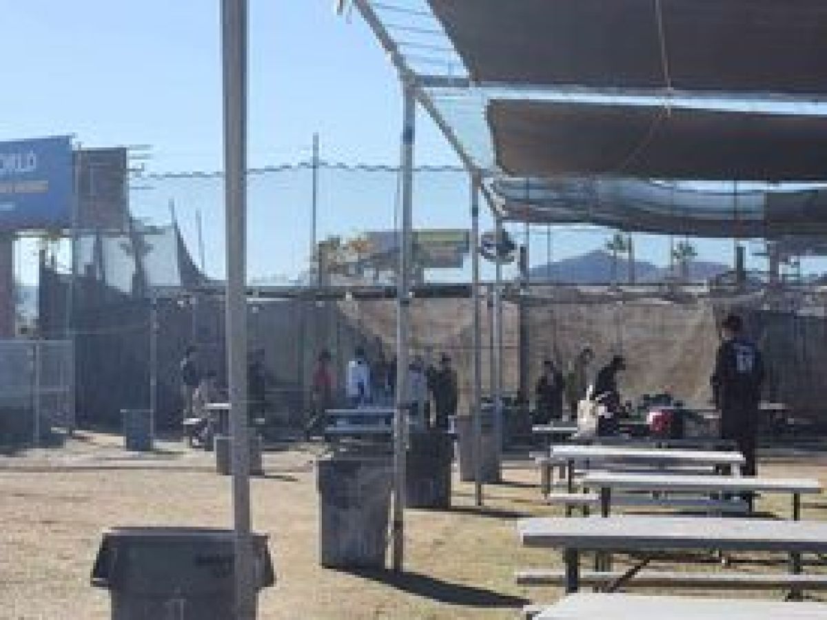 a group of people in front of a building