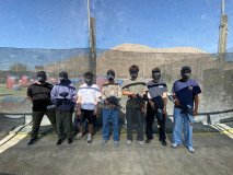 a group of people standing in front of a building