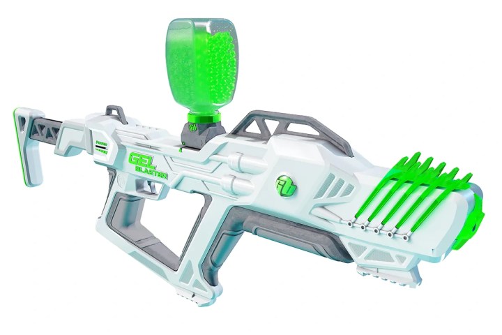 Futuristic white and green toy blaster with a green gel ammo container on top.